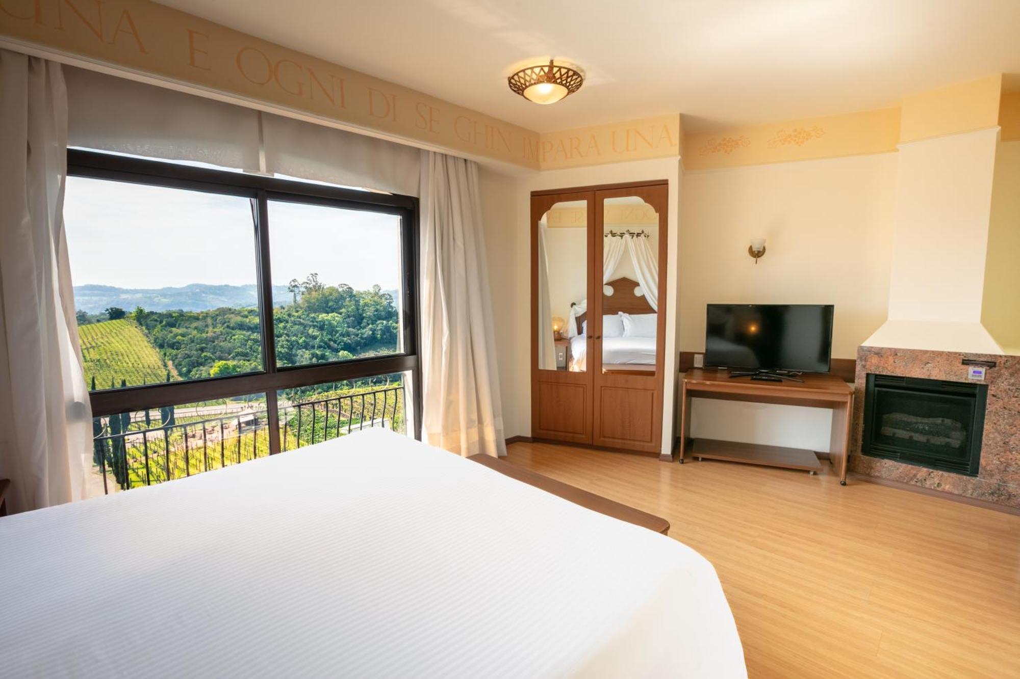 Spa Do Vinho Condominio Vitivinicola Bento Goncalves Ngoại thất bức ảnh A bedroom at the hotel